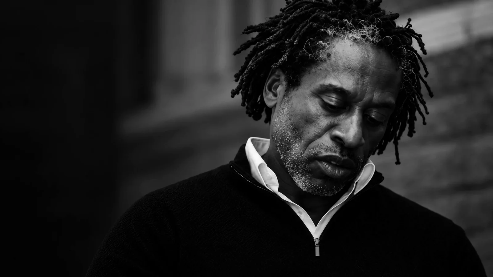 Uchenna Oranu in a reflective monochrome portrait